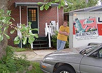 Al leaning against the U-Haul trailer on his last day living in North Carolina.